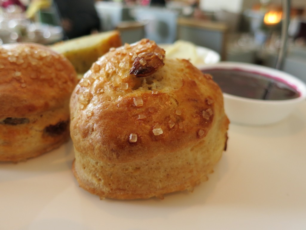 Warm Raisin Scone  with House Made Berry Preserve and Devonshire Clotted Cream