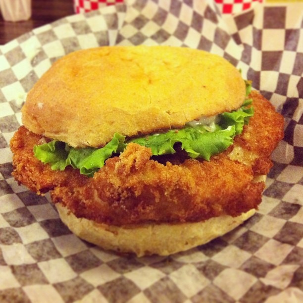 FISH BURGER Fried Haddock Filet, Lettuce, Tomato, Pickles, Onions, Tartar Sauce