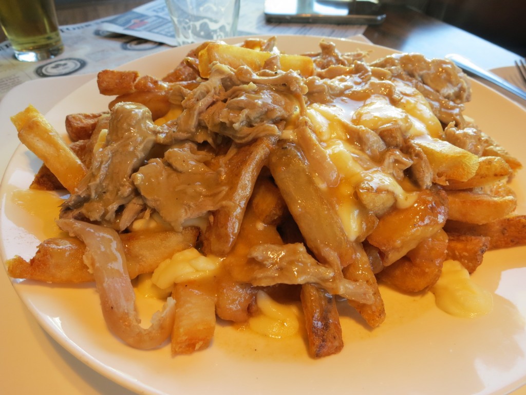 ONTARIO KING COLE DUCK CONFIT POUTINE Thornloe Ontario cheese curds, big Wheel chicken gravy