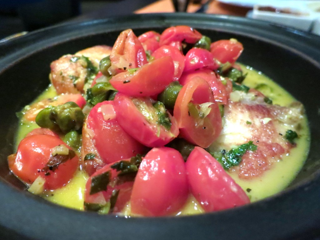 Tagine tilapia / white wine / saffron / capers / heirloom tomato sauce 